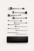 Method 01 Brush Collection: 12 silver makeup brushes laid out with the black brush clutch